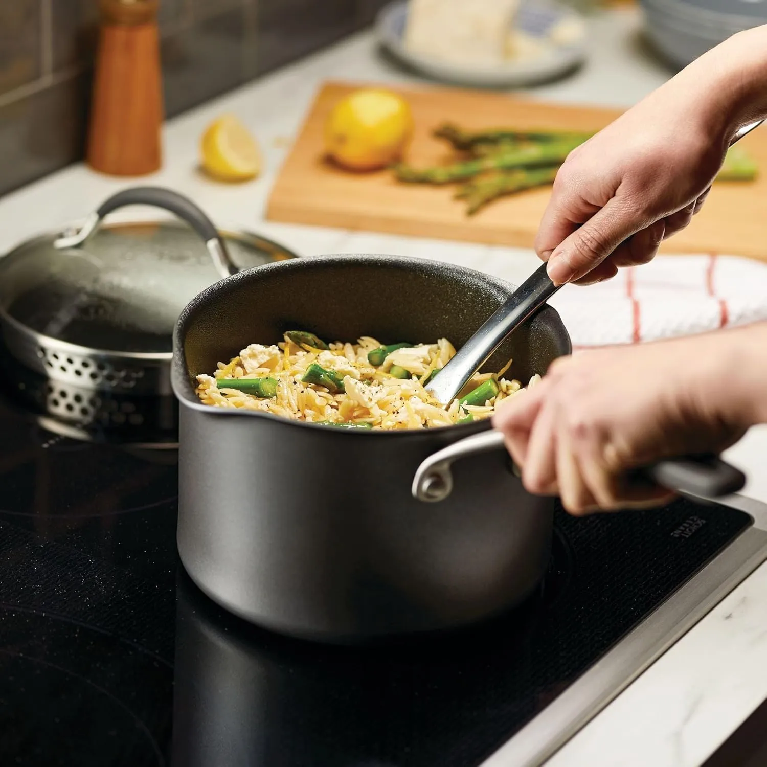 Circulon A1 Series with ScratchDefense Technology Nonstick Induction Straining Sauce Pan with Lid, 3 Quart, Aluminum, Graphite
