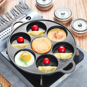 Non-stick cast iron pan with dividers for breakfast