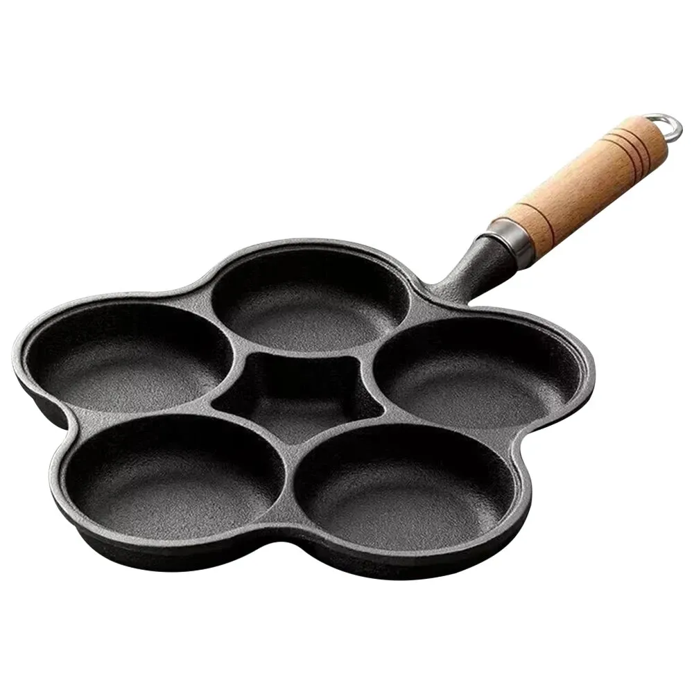 Non-stick cast iron pan with dividers for breakfast
