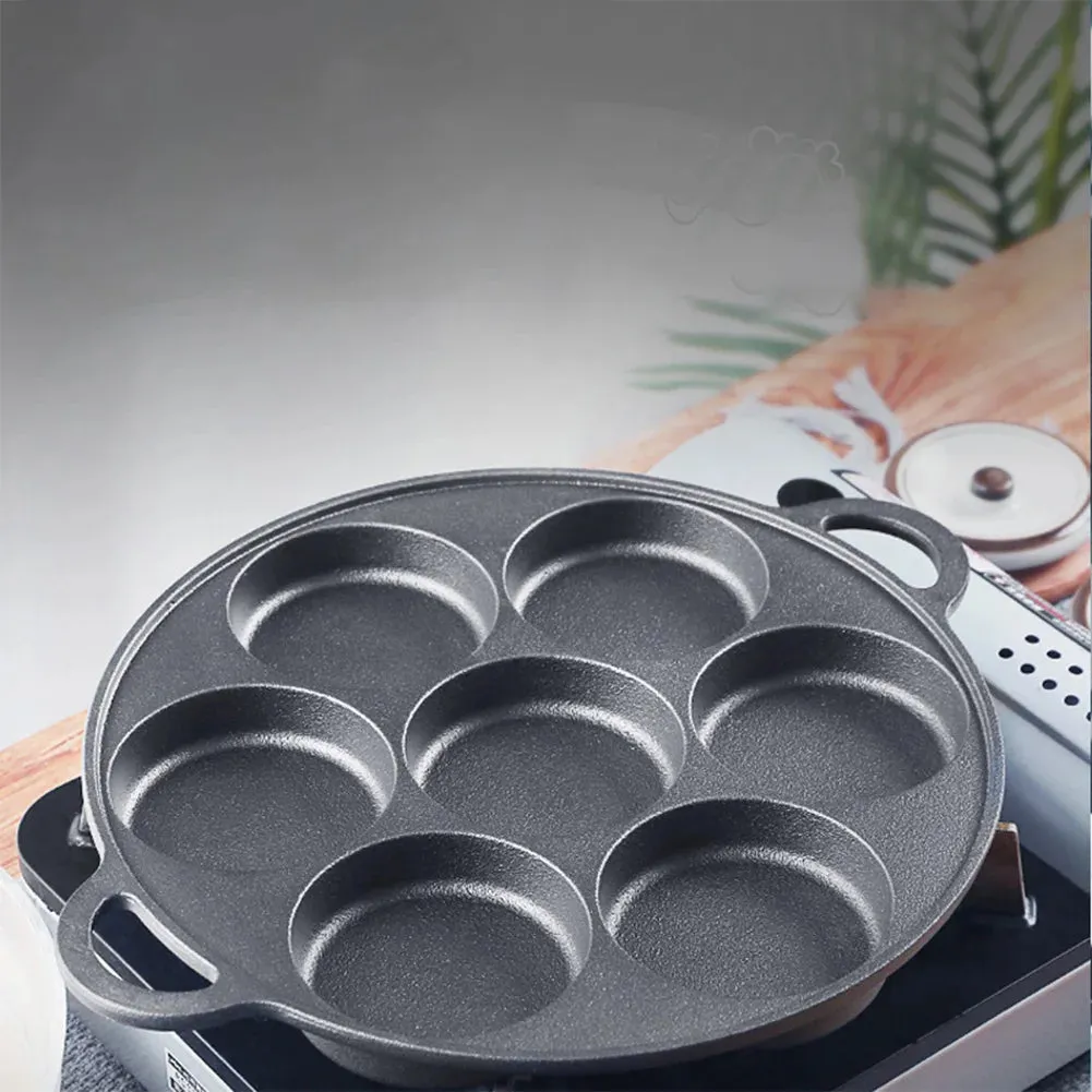Non-stick cast iron pan with dividers for breakfast