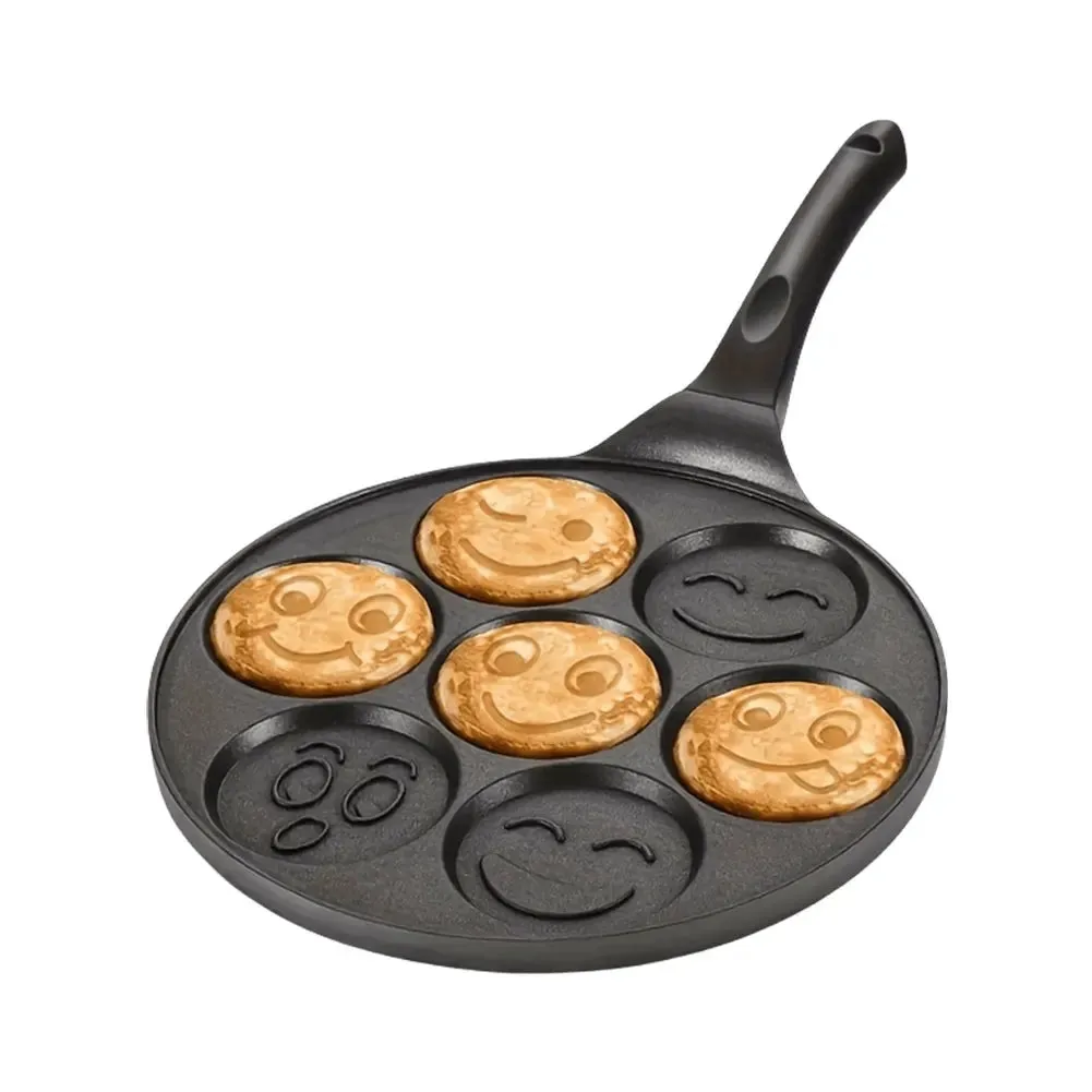Non-stick cast iron pan with dividers for breakfast