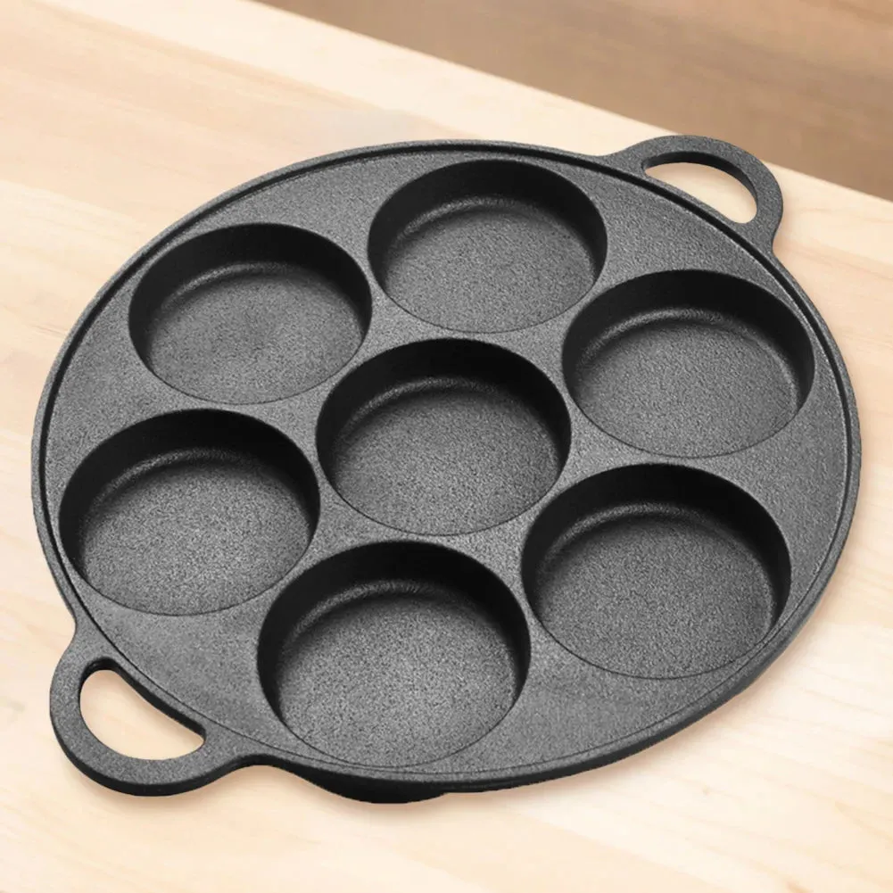 Non-stick cast iron pan with dividers for breakfast