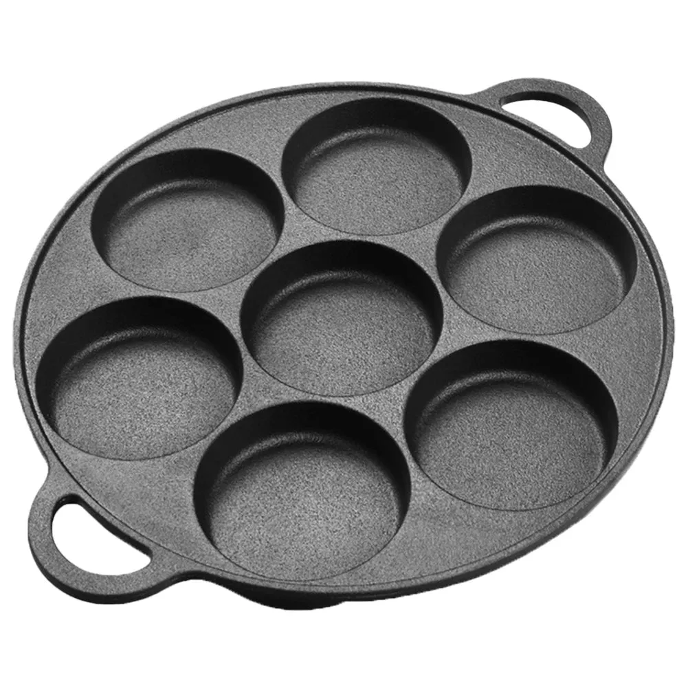 Non-stick cast iron pan with dividers for breakfast